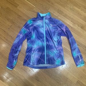 Bright neon Puma workout windbreaker.